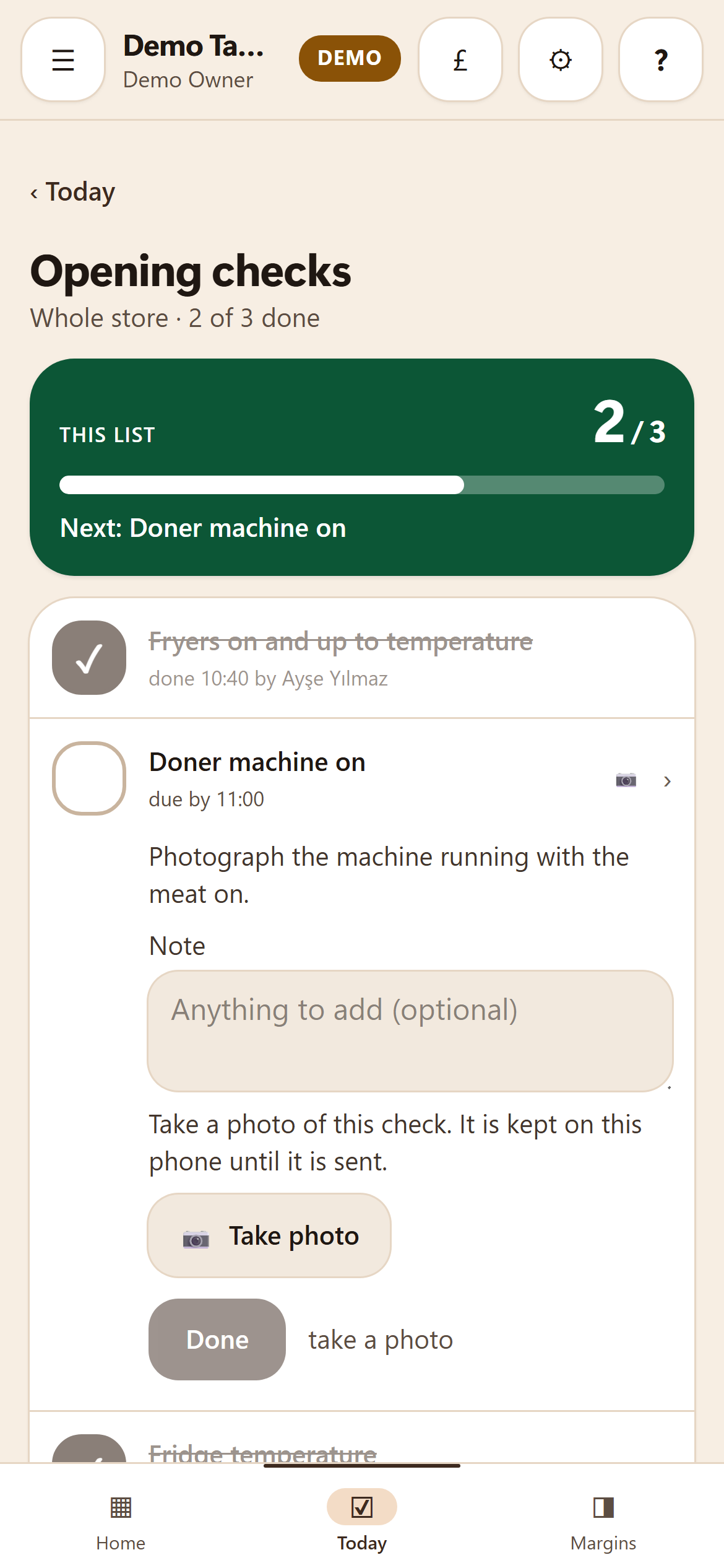 A cook’s Today screen on a phone: the items due at their station, two or three already ticked off, and an item that needs a photo still showing its camera button.